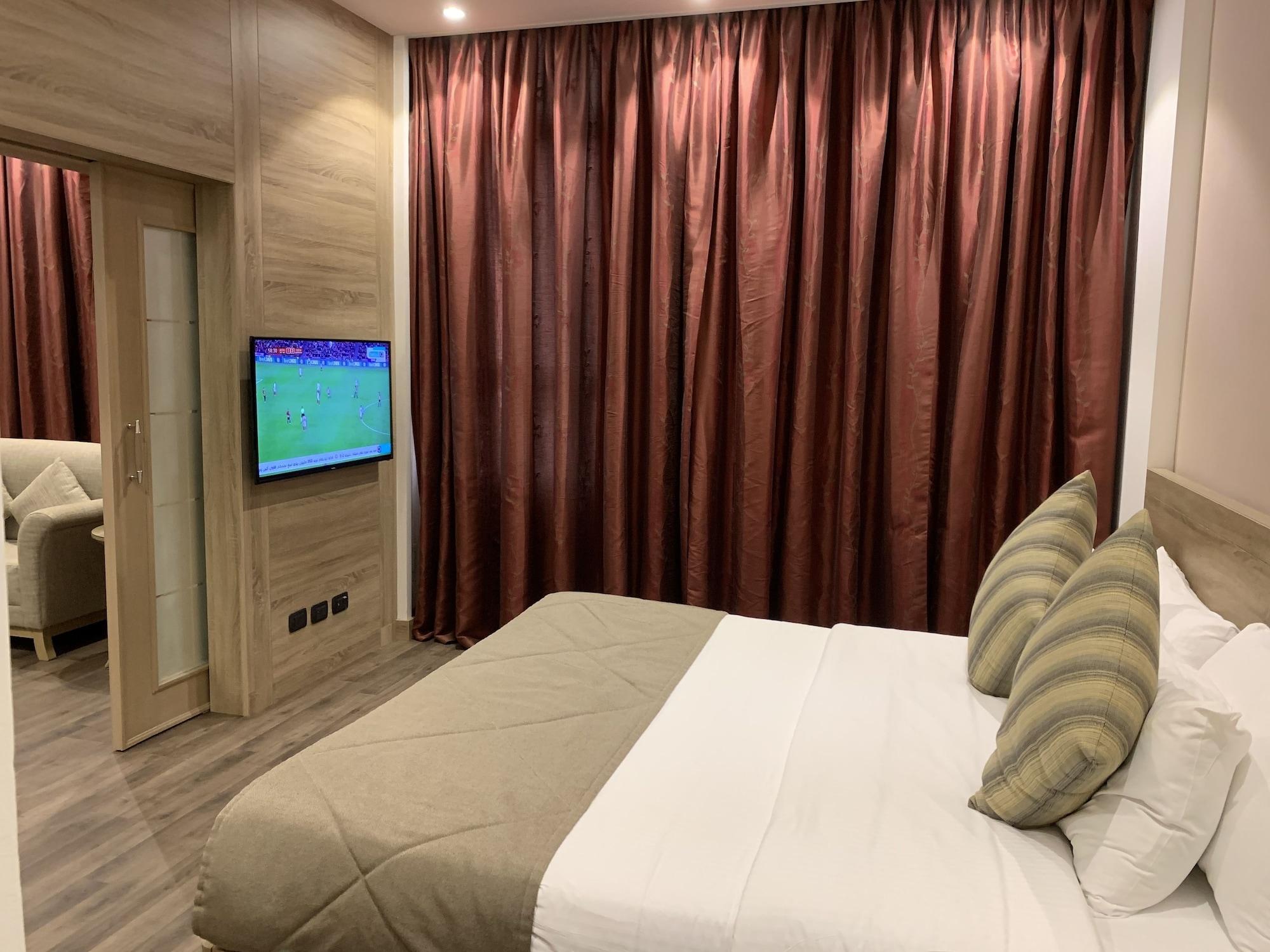 Carlton Al Moaibed Hotel Dammam Eksteriør bilde A bedroom in the hotel